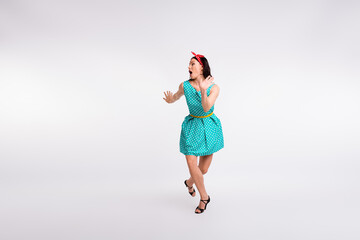 Full body photo of lovely woman look empty space have fun holiday dressed teal vintage style polka...