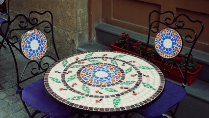 vintage coffee table and chairs with mosaic