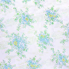 Seamless spring blue watercolor floral pattern on a fabric texture white background. Old retro fashion