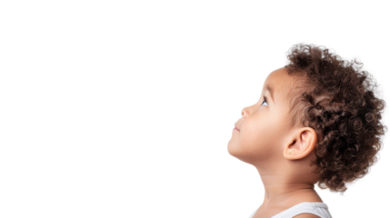 Child looking up with curiosity, white isolate background