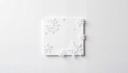 White snowflake decorations on blank canvas