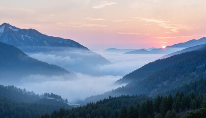 Obraz premium Misty mountain landscape at sunrise with colorful sky