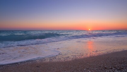 Fototapeta premium Waves on the beach at red sunset