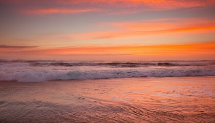 Obraz premium Waves on the beach at red sunset