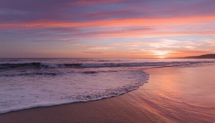 Waves on the beach at red sunset