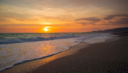 Waves on the beach at red sunset