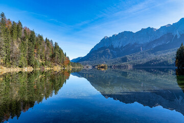 Autumn colors in fall at lake Eibsee, Garmisch-Partenkirchen, Bavarian alps, Germany