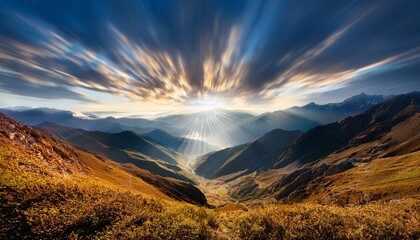 Waves of light in the mountain valley stretch into the sky