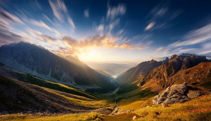 Waves of light in the mountain valley stretch into the sky