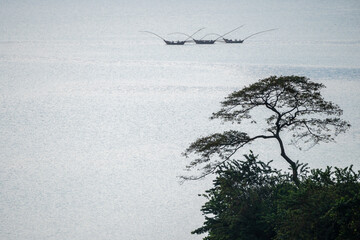 Stunning colors over Lake Kivu with buildings nearby, Rwanda