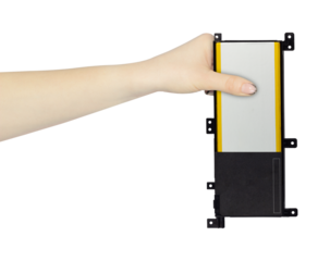 laptop battery in hand isolated from background, concept of hand over or throw away	
