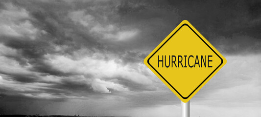 danger,caution,Hurricane Idalia warning sign against a powerful stormy background with copy space....