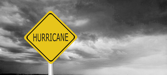danger,caution,Hurricane Idalia warning sign against a powerful stormy background with copy space....