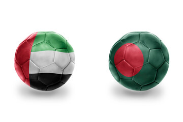 football balls with national flags of bangladesh and united arab emirates ,soccer teams. on the white background.