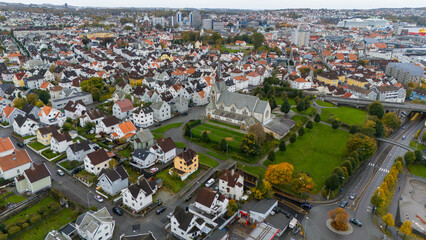 Obraz premium Aerial View of European City with Church and Houses