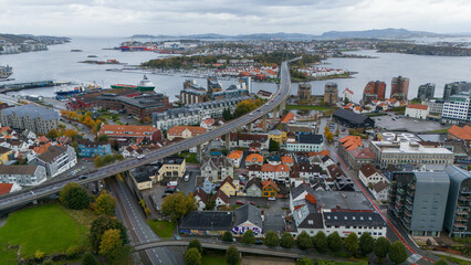 Aerial View of Coastal City with Bridge and Harbor