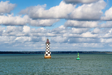 Black and white lighthouse of Ile Tudy in Brittany in France