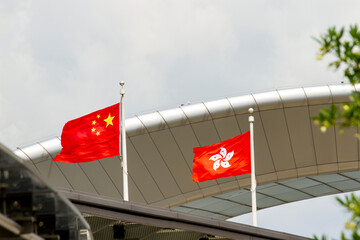 Flags Of China And Hong Kong SAR On A Building.