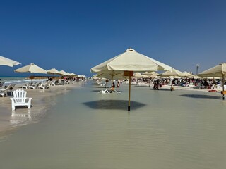 Beach Umbrellas Submerged in Rising Tides