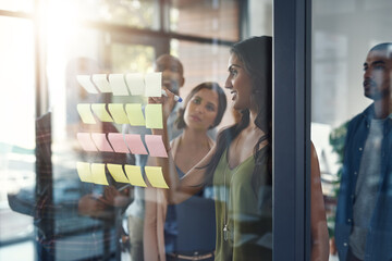 Glass, seminar and writing with business people in office for coaching, meeting or planning....