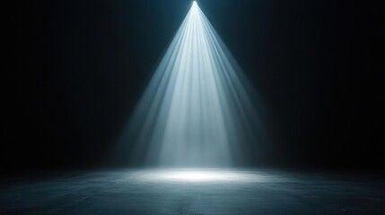 A single spotlight creating a tunnel of light through dense fog on an outdoor stage