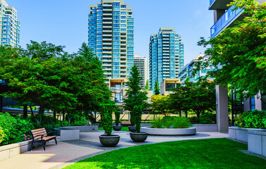 Garden oasis set amongst towering high-rise residential condominiums in Burnaby, BC, Canada.