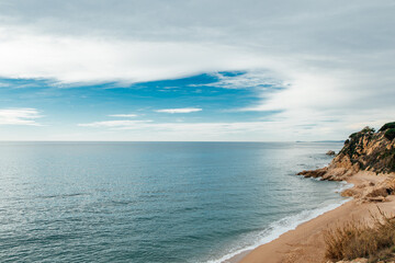 beach with sky and clouds