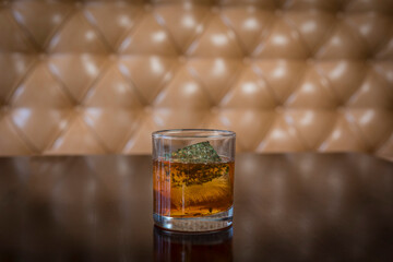 Whiskey Old Fashion sitting on table