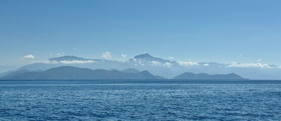 Beautiful landscape of mountains with clouds around the mountains Fethiye Gulf in Turkey