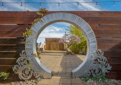 Lemmon, South Dakota, United States &ndash; October 27, 2024:  Walkway through a fence on Main Street