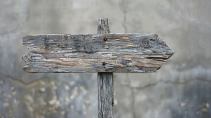 Naklejka premium An old wooden signpost with weathered textures and aged wood grain