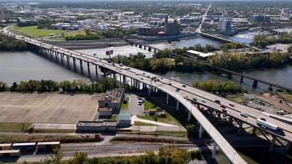 Aerial interstate travel over James River Richmond, VA city downtown 