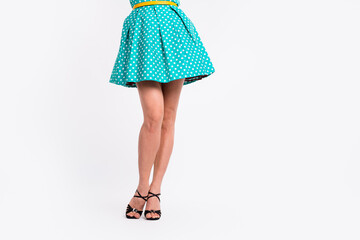 Cropped photo of pretty girl legs shoes posing holiday wear high heels teal retro style polka dot...