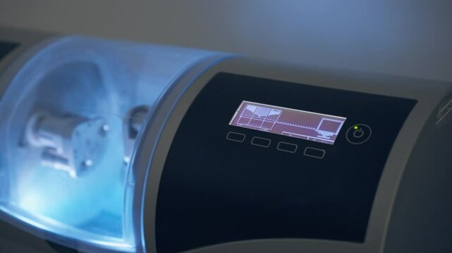 close-up professional laboratory for the production of dental prosthesis veneers equipment cutting out dental molds according to model