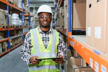 Happy African American warehouse worker