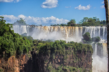 Fototapeta premium Panoramic view of Iguazu Falls on a sunny day, Misiones, Argentina