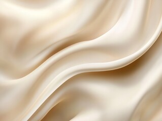 Obraz premium A close-up view of flowing beige silk fabric, showcasing its smooth texture and gentle curves.