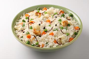 Indian veg biryani, veg pulav, Indian vegetable pulav, Biriyani, vegetable Biriyani served in a ceramic bowl