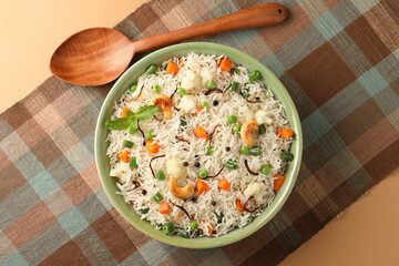 Indian veg biryani, veg pulav, Indian vegetable pulav, Biriyani, vegetable Biriyani served in a ceramic bowl