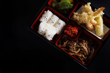 tempura bento set japanese food isolate in black background