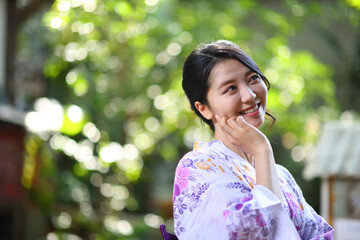portrait woman with yukata dress in the garden