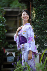 portrait woman with yukata dress in the garden