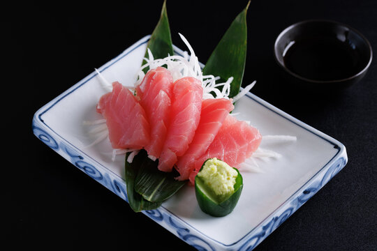 Tuna sashimi isolated in black background