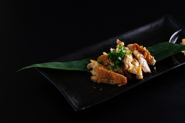 Chicken Teriyaki grill chicken Japanese Food isolate in black background