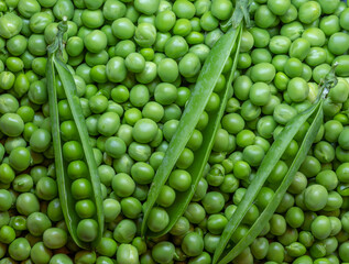 Top view of shelled fresh green peas.