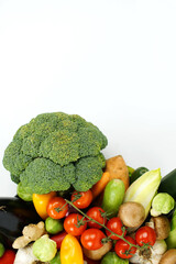 Vertical Top-View of Mixed Organic Vegetables, White Background