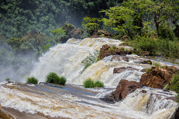 View of the force of the water at the edge of a waterfall at Iguazu Falls, Misiones, Argentina