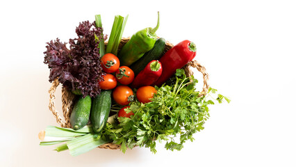 Vegetables in the basket organic vegetables on background