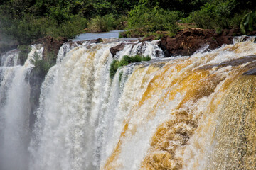 View of the force of the water at the edge of a waterfall at Iguazu Falls, Misiones, Argentina