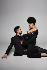 A couple expresses their deep connection in an intimate pose, radiating love and passion.